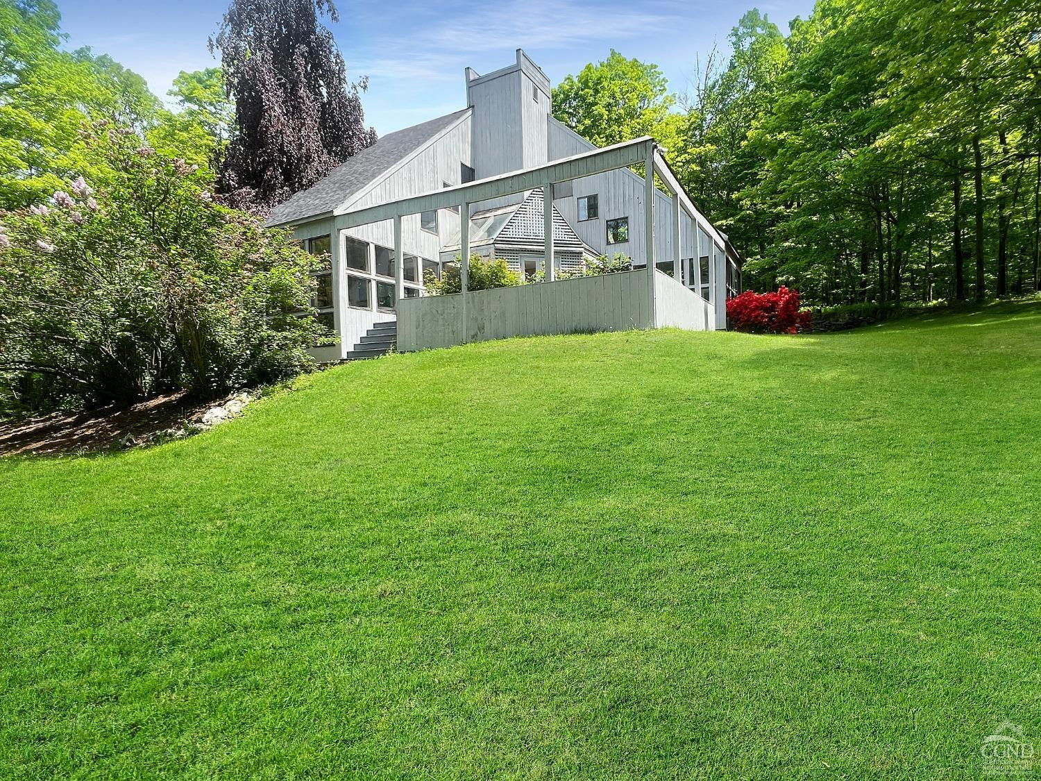 208 Cambridge Road Copake, NY 12529 - Photo 8 of 36 a front view of house with yard and green space