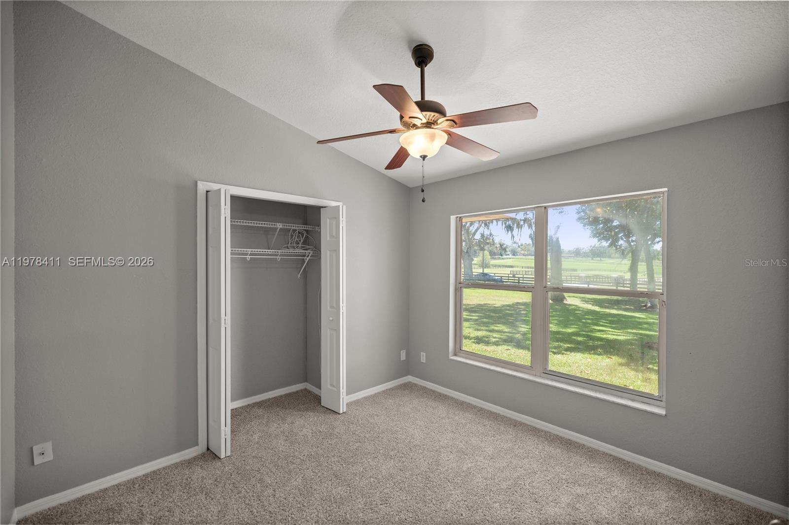 1699 Southwest 80th Street Ocala, FL 34476 - Photo 22 of 47 a view of an empty room with a window