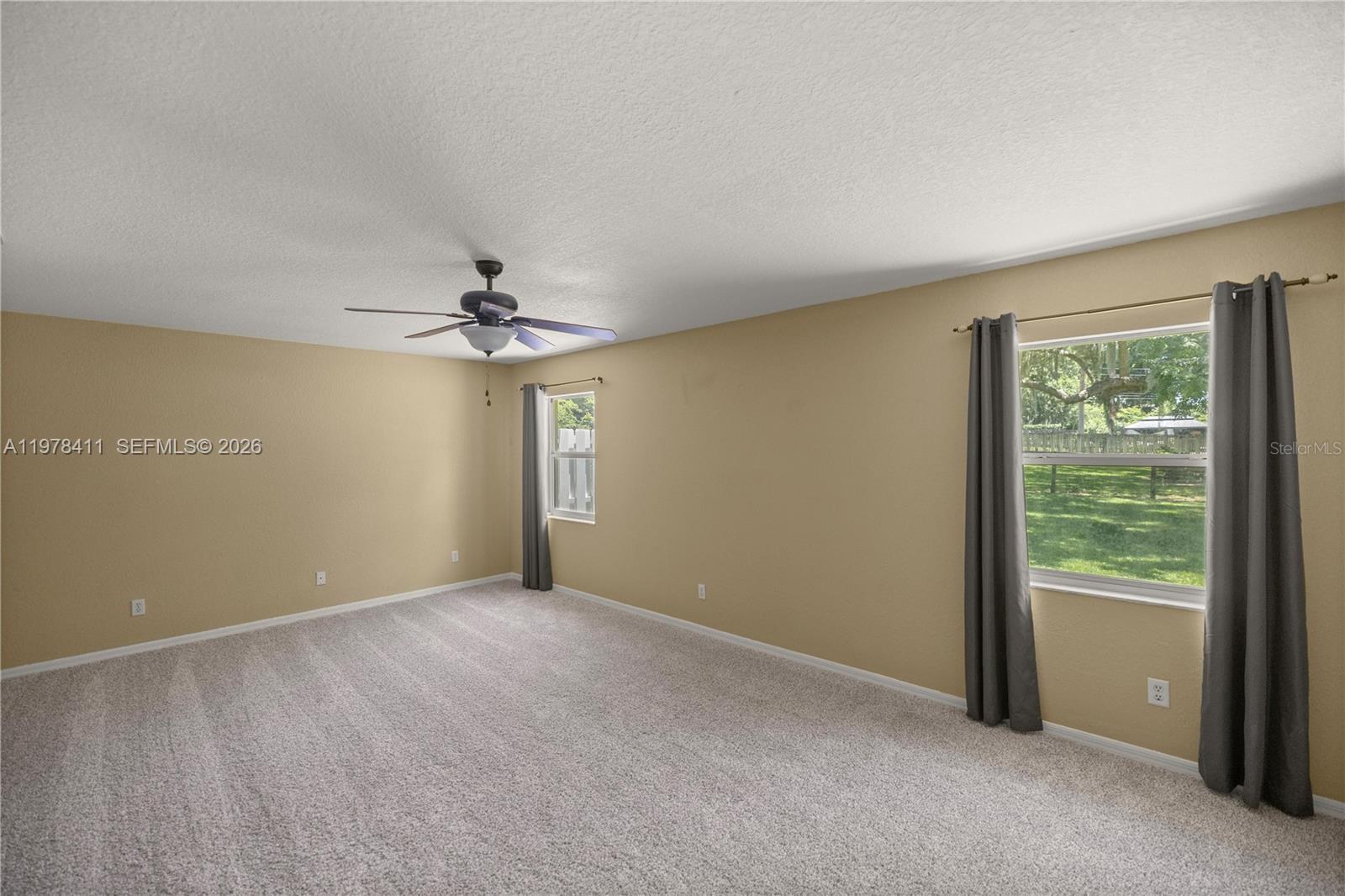 1699 Southwest 80th Street Ocala, FL 34476 - Photo 25 of 47 an empty room with a empty space and a window
