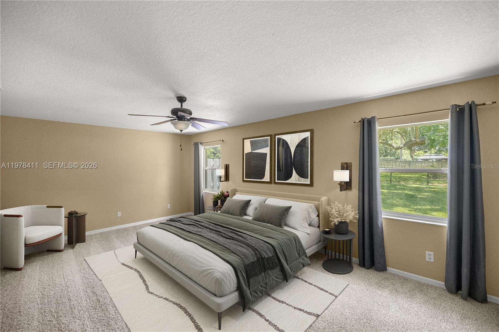 1699 Southwest 80th Street Ocala, FL 34476 - Photo 31 of 47 a bedroom with a large bed and a window