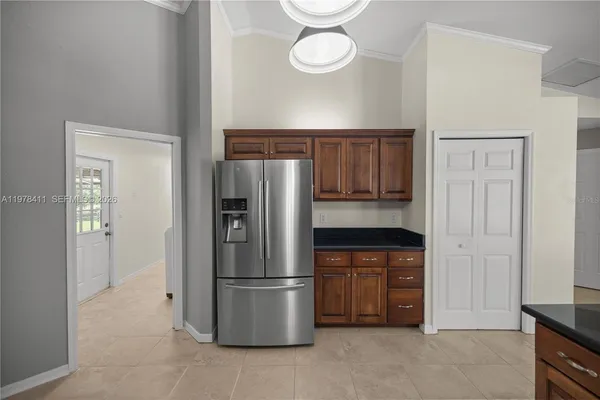 a kitchen with a sink stove and microwave