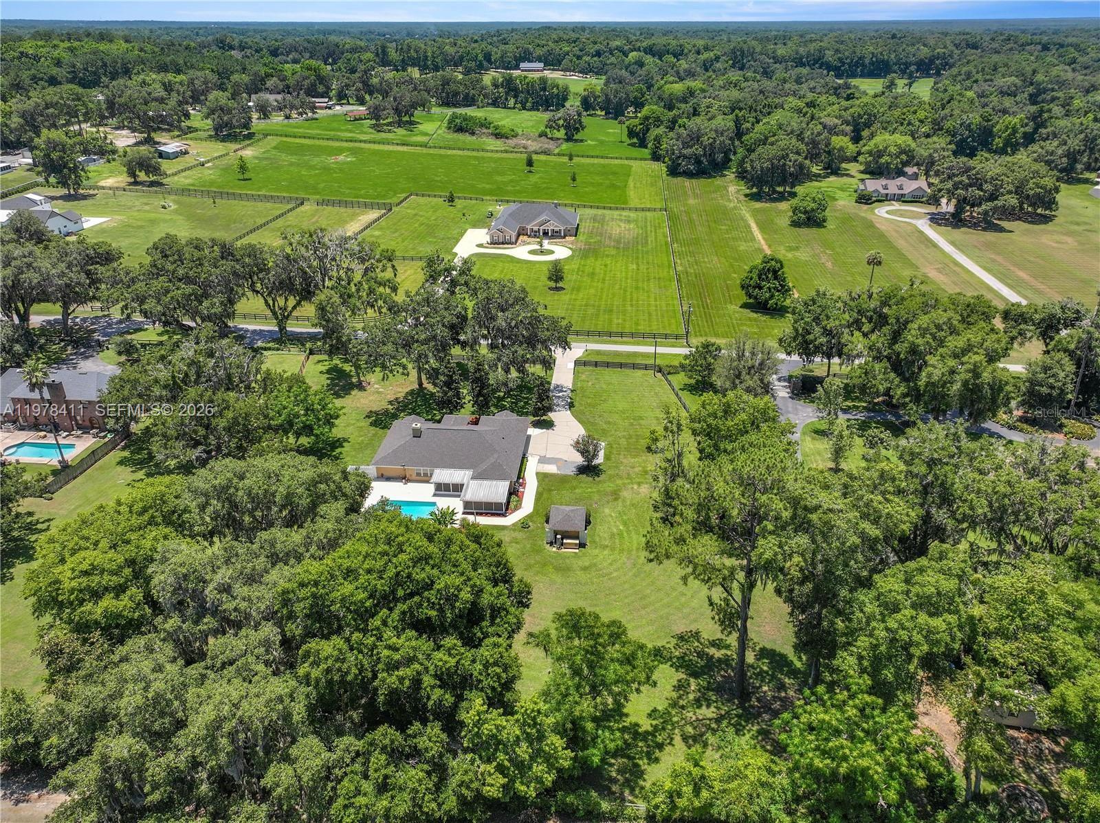 1699 Southwest 80th Street Ocala, FL 34476 - Photo 45 of 47 an aerial view of a houses with outdoor space and street view