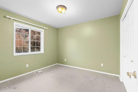 an empty room with a window