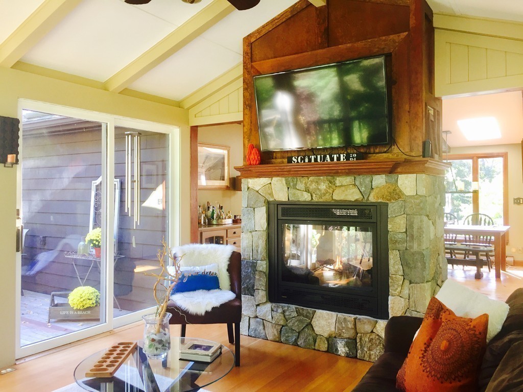 10 Wamsutta Road Scituate, MA 02066 - Photo 12 of 30 a living room with furniture and a flat screen tv