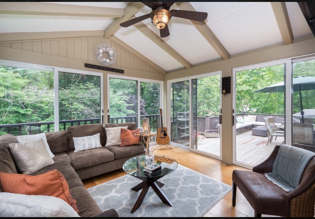 10 Wamsutta Road Scituate, MA 02066 - Photo 13 of 30 a living room with furniture and a floor to ceiling window