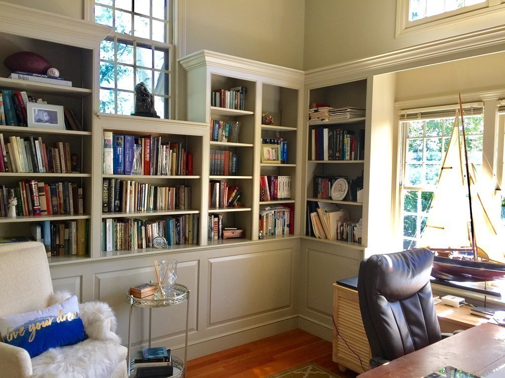 10 Wamsutta Road Scituate, MA 02066 - Photo 21 of 30 a living room with furniture and a book shelf