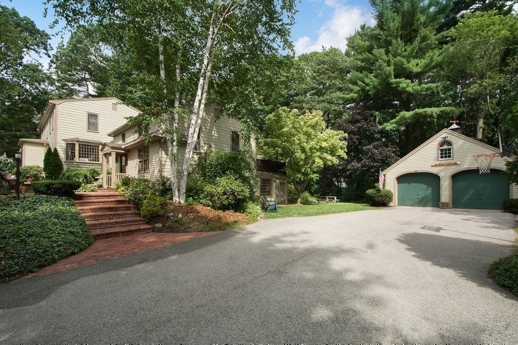 10 Wamsutta Road Scituate, MA 02066 - Photo 29 of 30 a view of a large house with large trees and plants