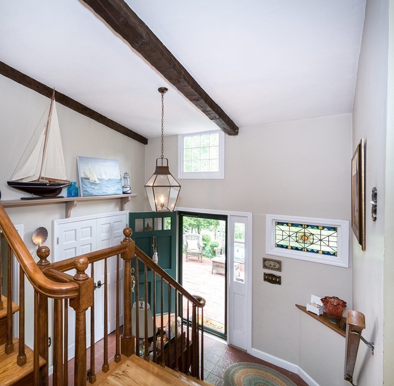 10 Wamsutta Road Scituate, MA 02066 - Photo 7 of 30 a view of a hallway with furniture and floor to ceiling window