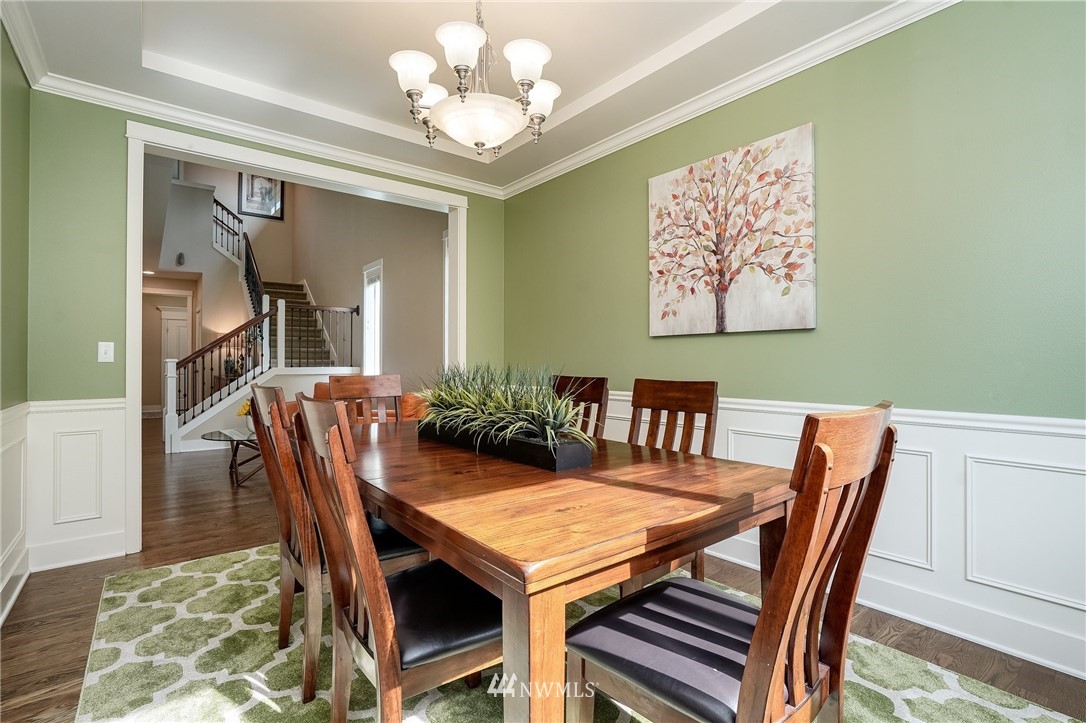 3408 223rd Place Southeast Bothell, WA 98021 - Photo 12 of 40 a view of a dining room with furniture