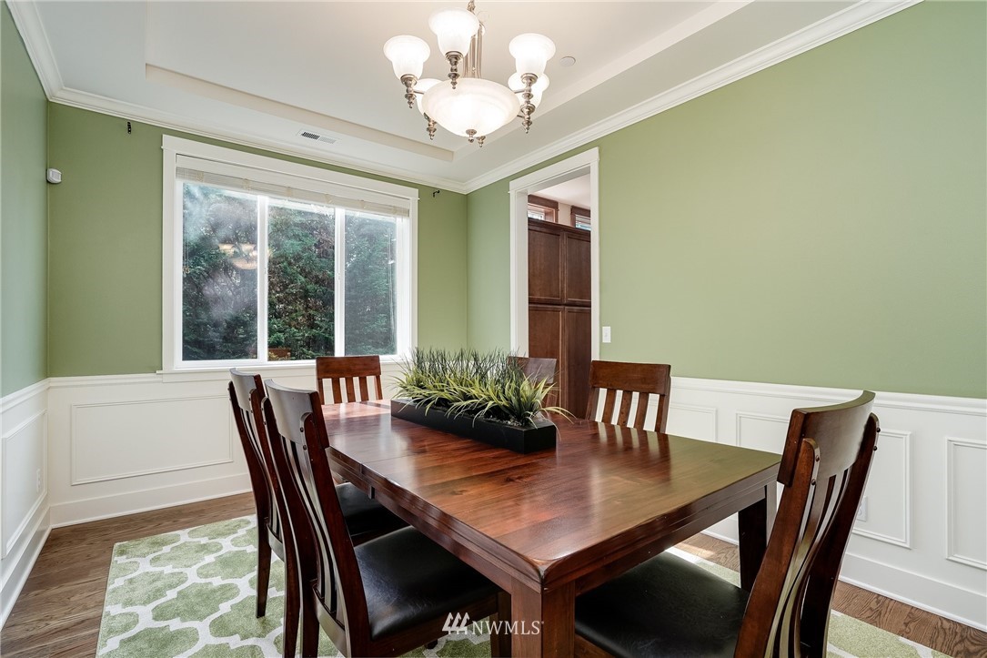 3408 223rd Place Southeast Bothell, WA 98021 - Photo 13 of 40 a view of a dining room with furniture window and outside view
