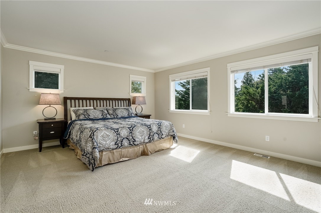 3408 223rd Place Southeast Bothell, WA 98021 - Photo 21 of 40 a bedroom with a bed and window
