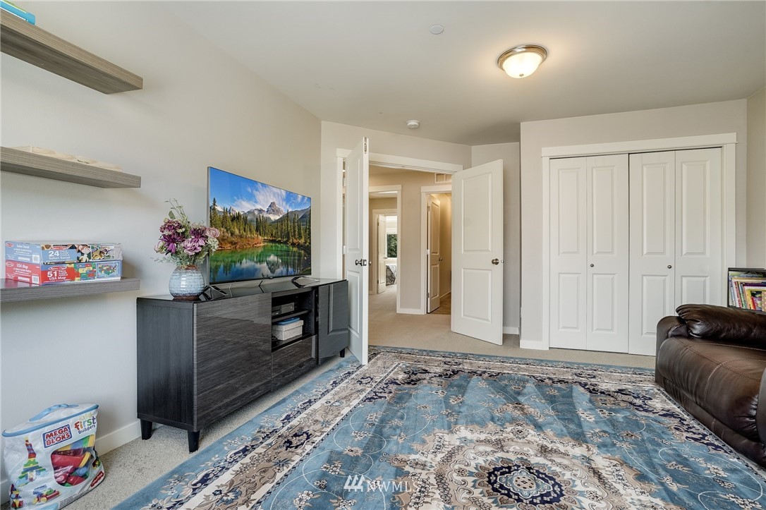 3408 223rd Place Southeast Bothell, WA 98021 - Photo 27 of 40 a living room with furniture