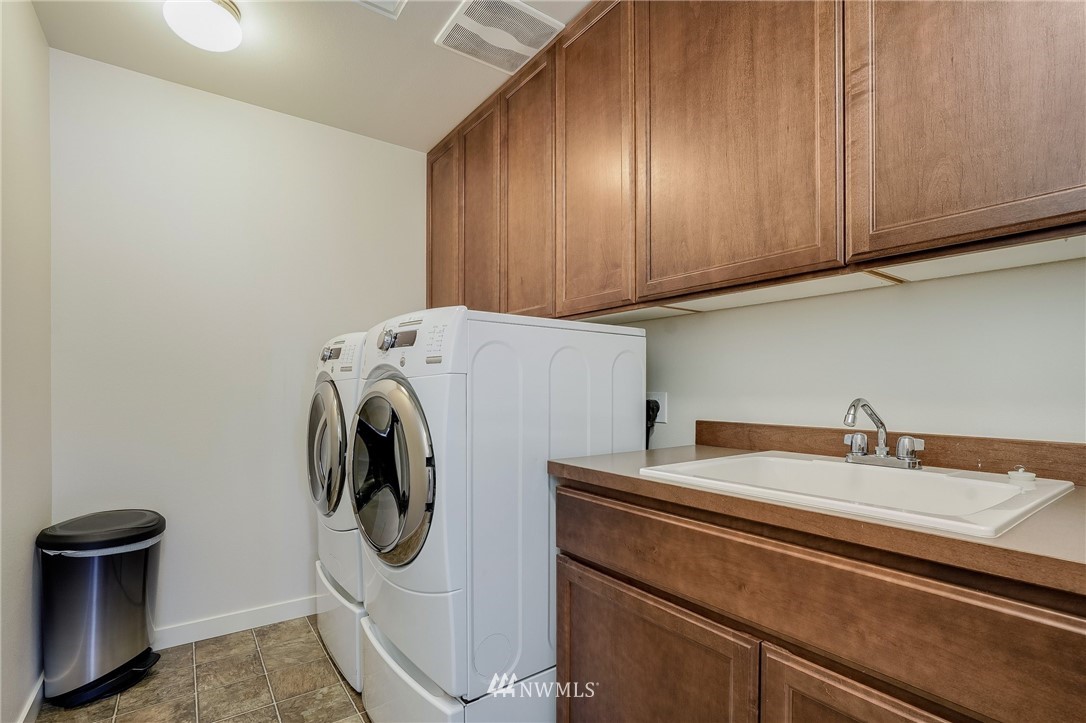 3408 223rd Place Southeast Bothell, WA 98021 - Photo 34 of 40 a utility room with dryer and washer
