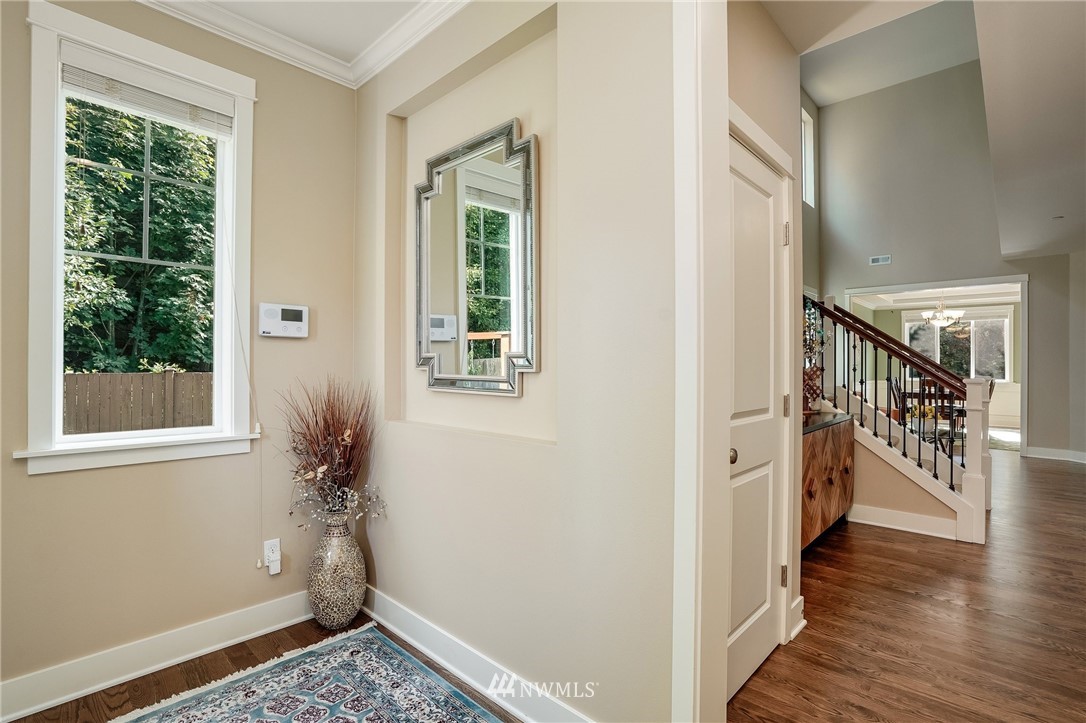 3408 223rd Place Southeast Bothell, WA 98021 - Photo 35 of 40 a view of hallway with windows and stairs