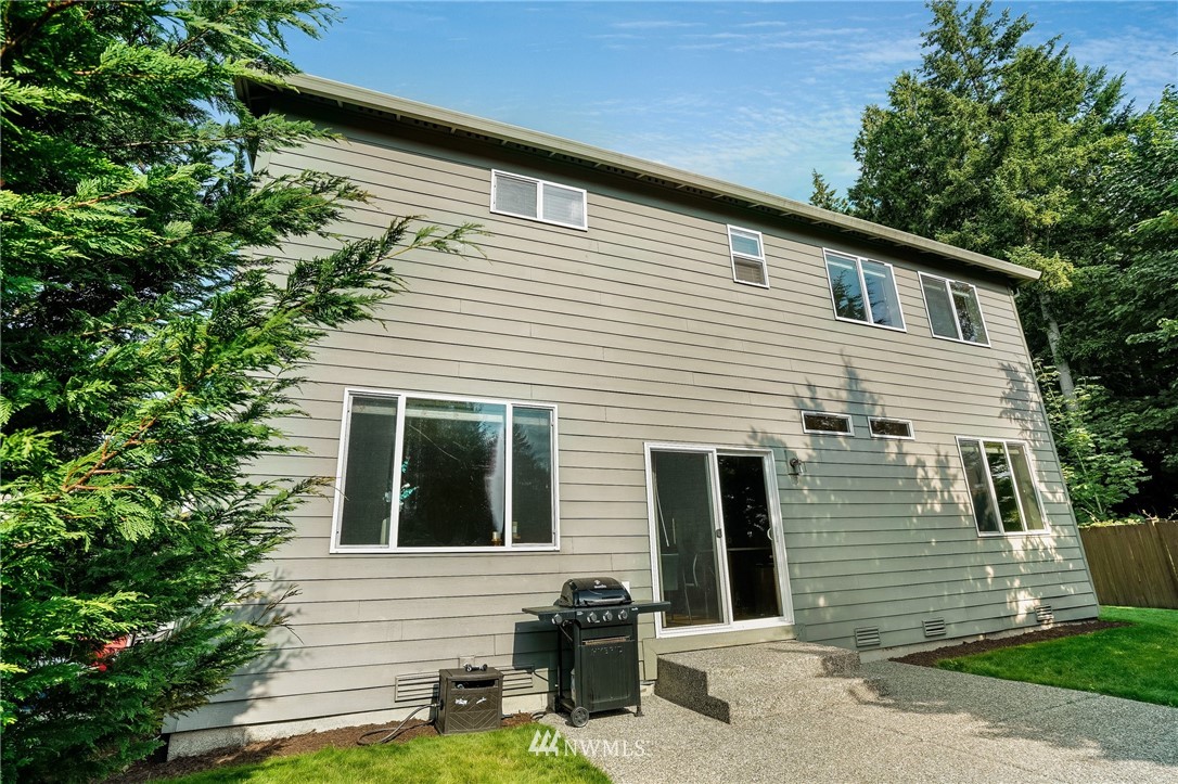 3408 223rd Place Southeast Bothell, WA 98021 - Photo 36 of 40 a view of a house with a yard