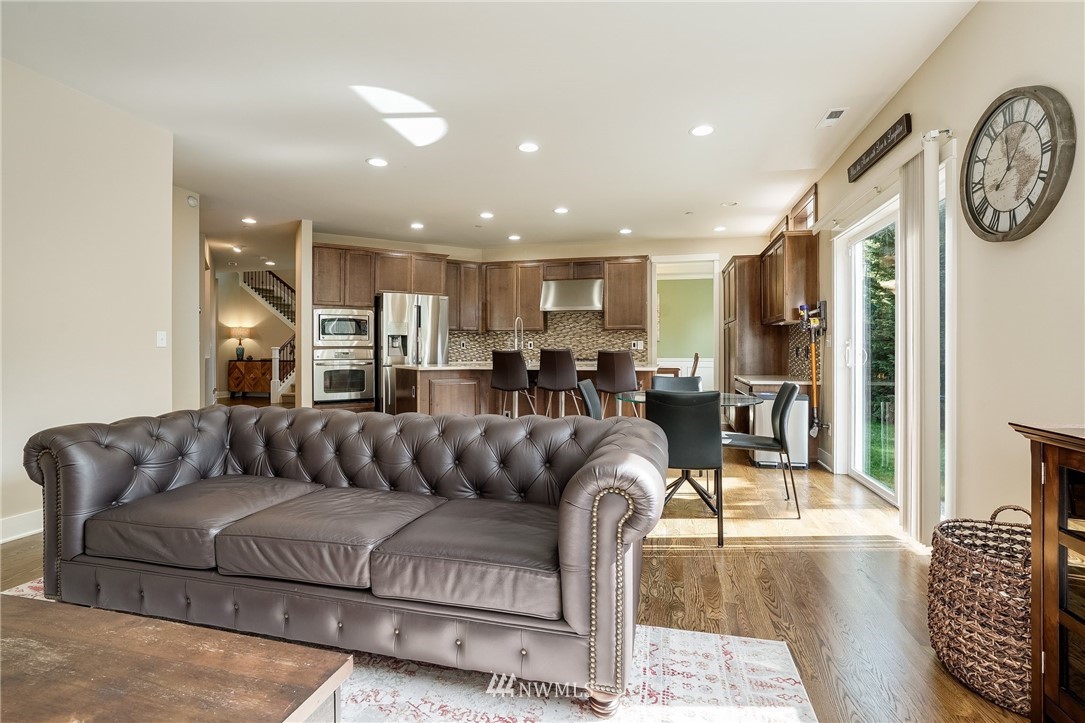 3408 223rd Place Southeast Bothell, WA 98021 - Photo 6 of 40 a living room with furniture and a view of kitchen