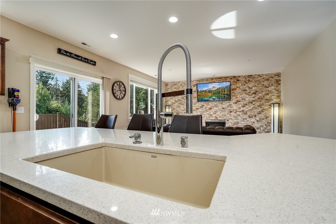 3408 223rd Place Southeast Bothell, WA 98021 - Photo 10 of 40 a view of swimming pool kitchen with a large window