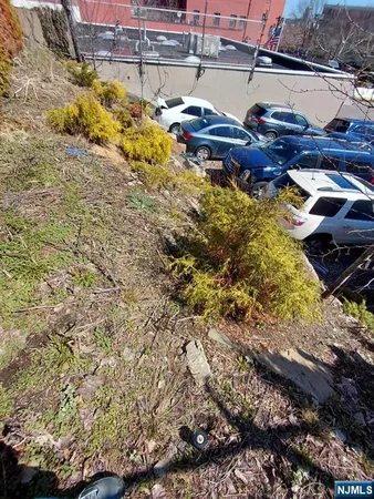 a view of residential houses with outdoor space