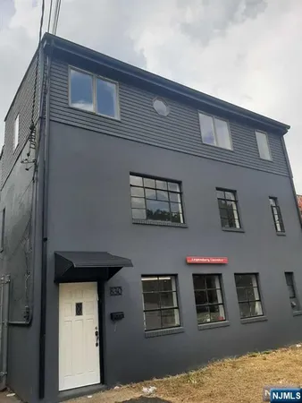 a front view of a house with windows