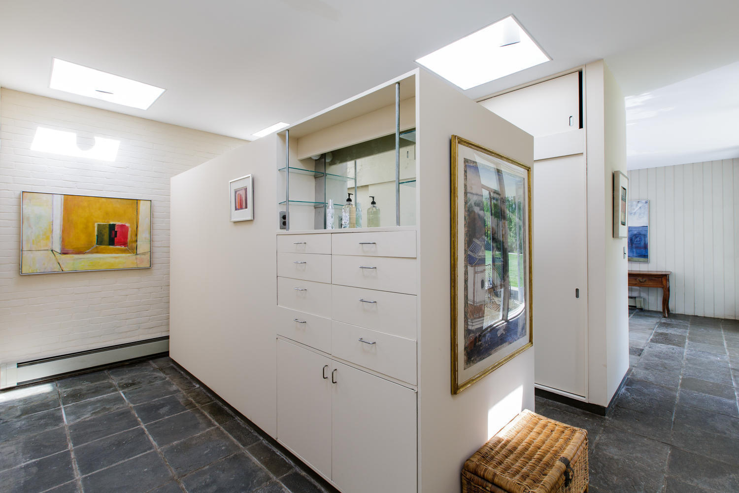 90 Lambert Road New Canaan, CT 06840 - Photo 14 of 28 a view of a hallway with closet and wooden floor