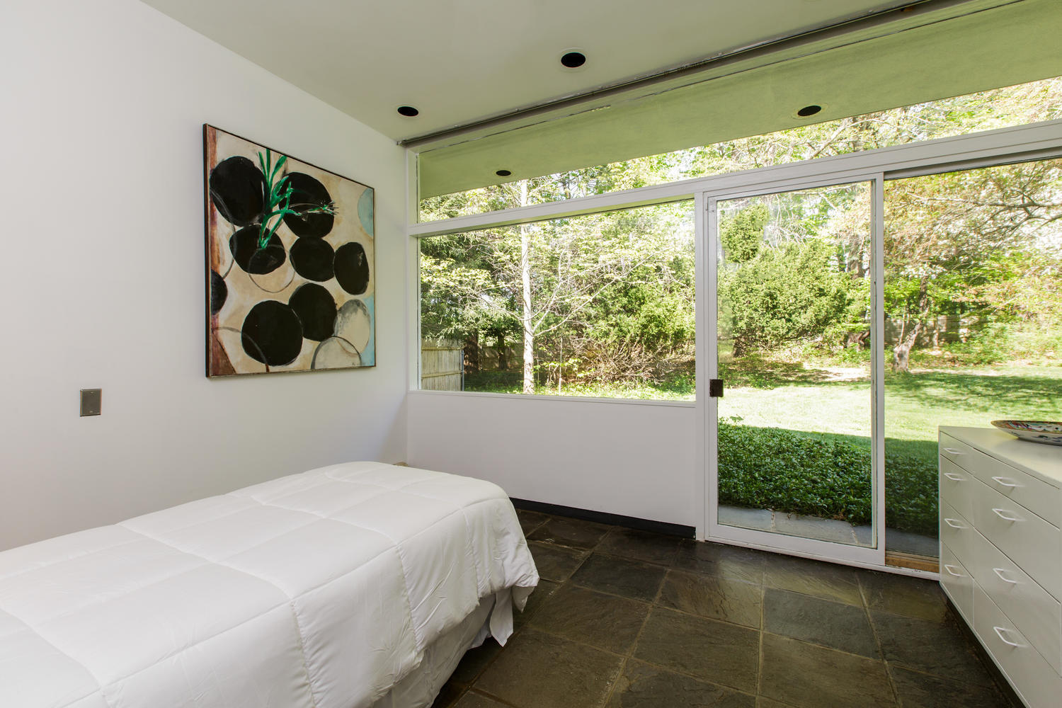 90 Lambert Road New Canaan, CT 06840 - Photo 18 of 28 a bedroom with a bed and a window