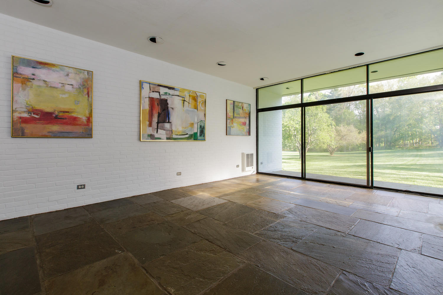 90 Lambert Road New Canaan, CT 06840 - Photo 25 of 28 a view of an empty room with sliding door