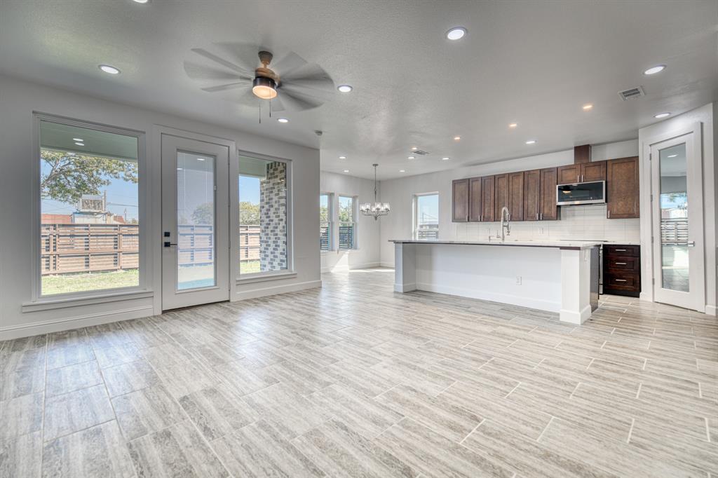 809 South Adelaide Street Terrell, TX 75160 - Photo 15 of 38 a view of kitchen with cabinets and wooden floor