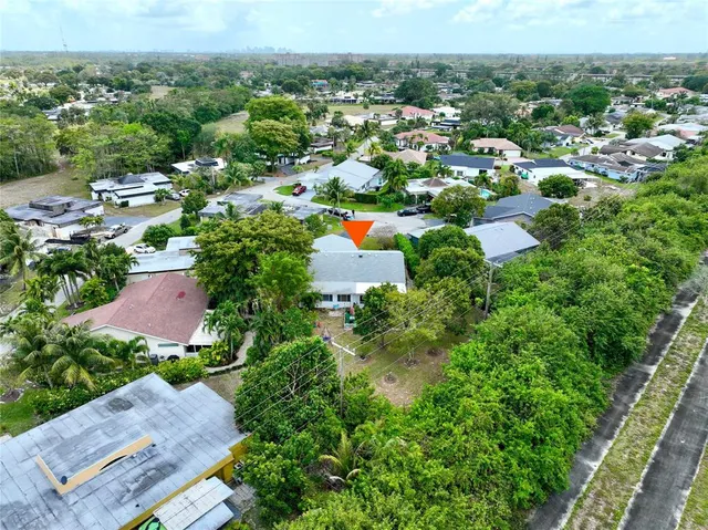 a fire hydrant in the middle of a field