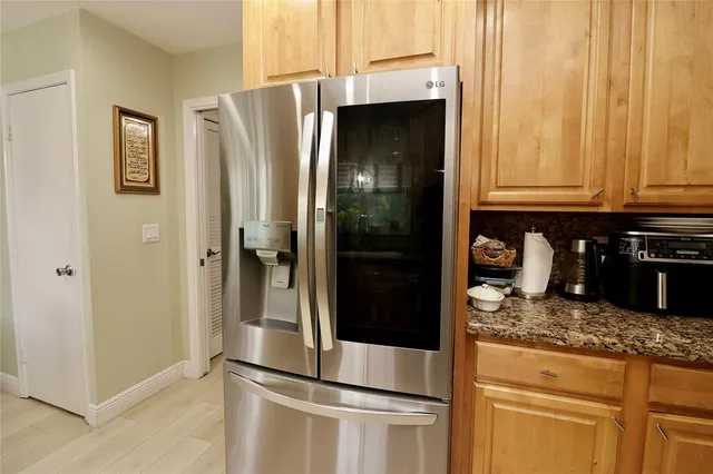 a bedroom with bed and window