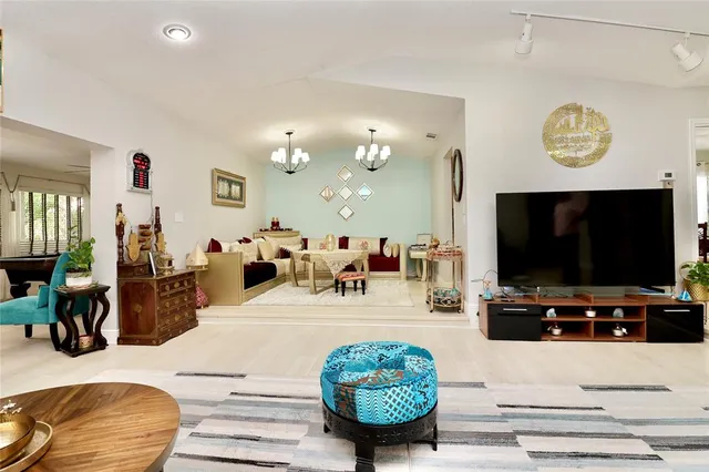 a en suite bathroom with a sink double vanity and a mirror