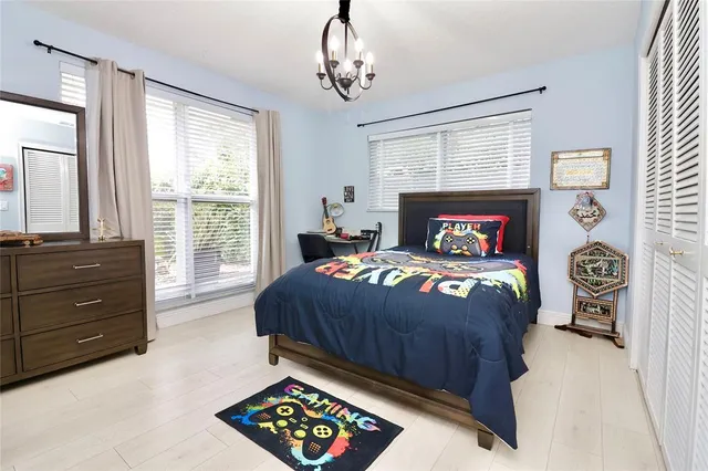 a view of a basketball area with trees