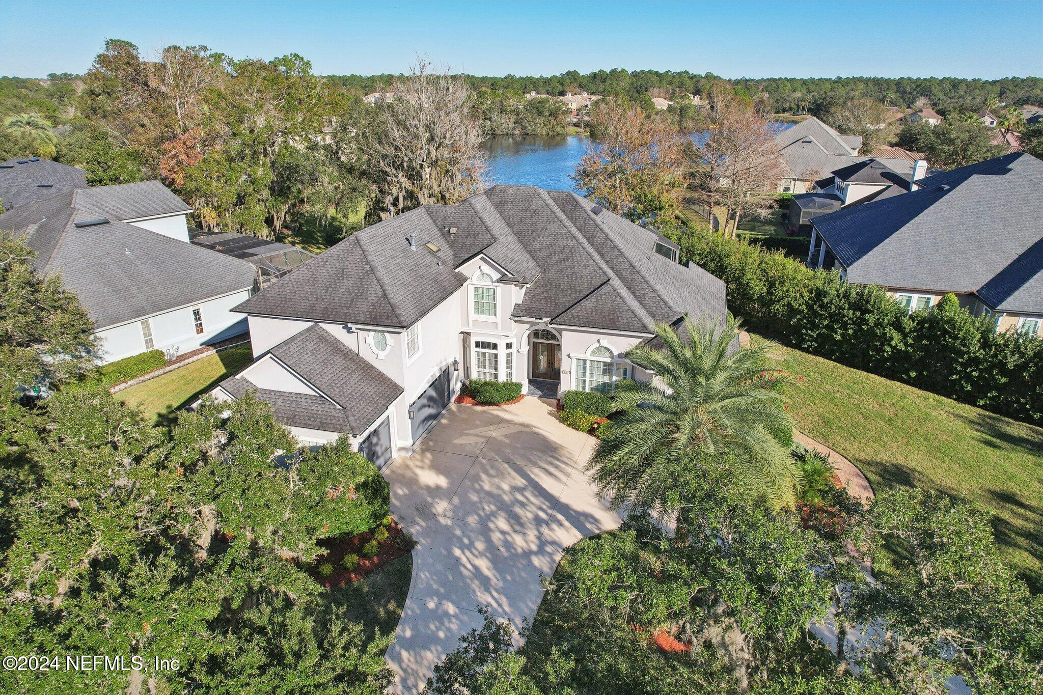 an aerial view of a house with a garden