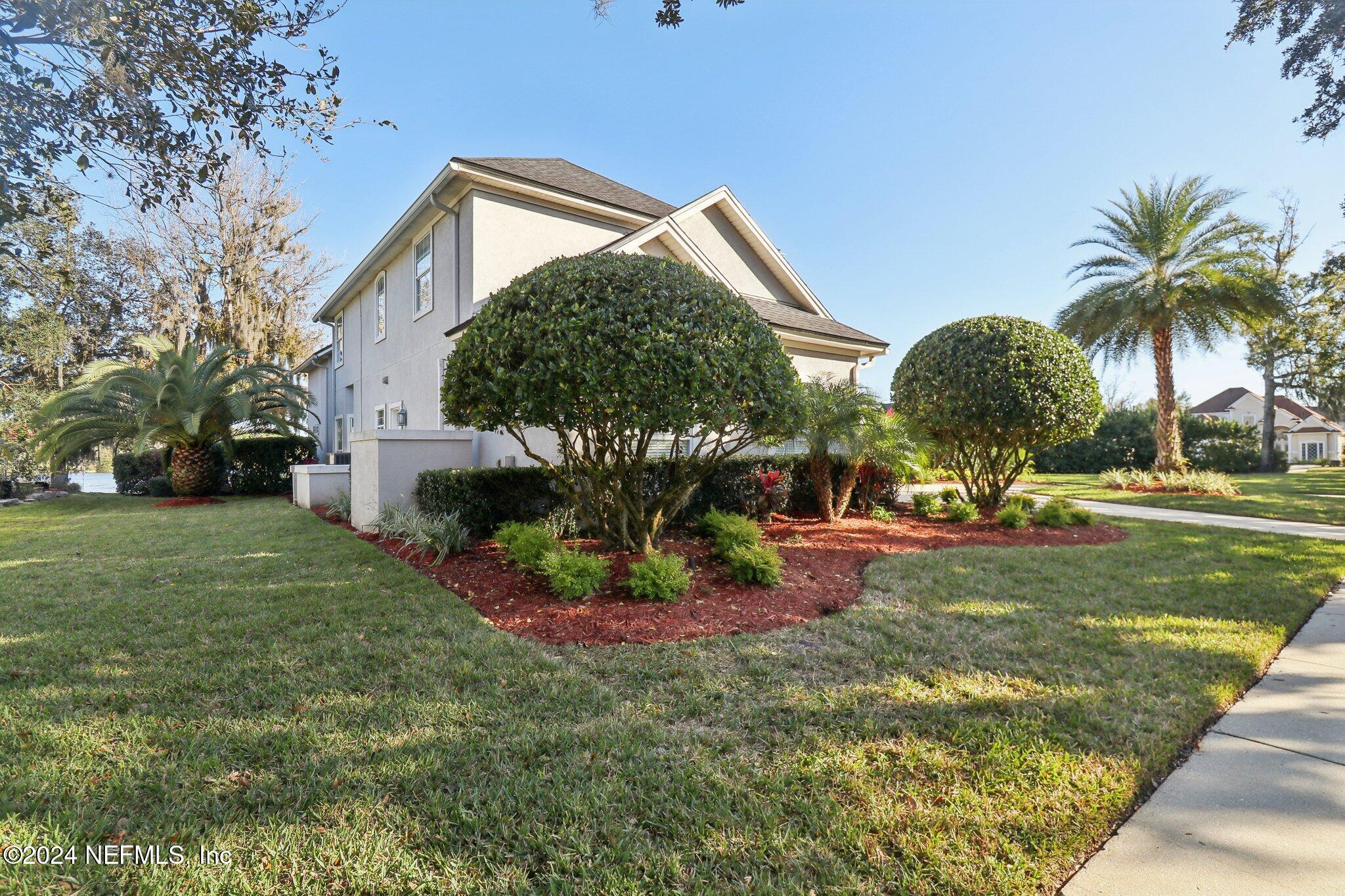 240 Pinehurst Pointe Drive St. Augustine, FL 32092 - Photo 58 of 70 a view of a backyard
