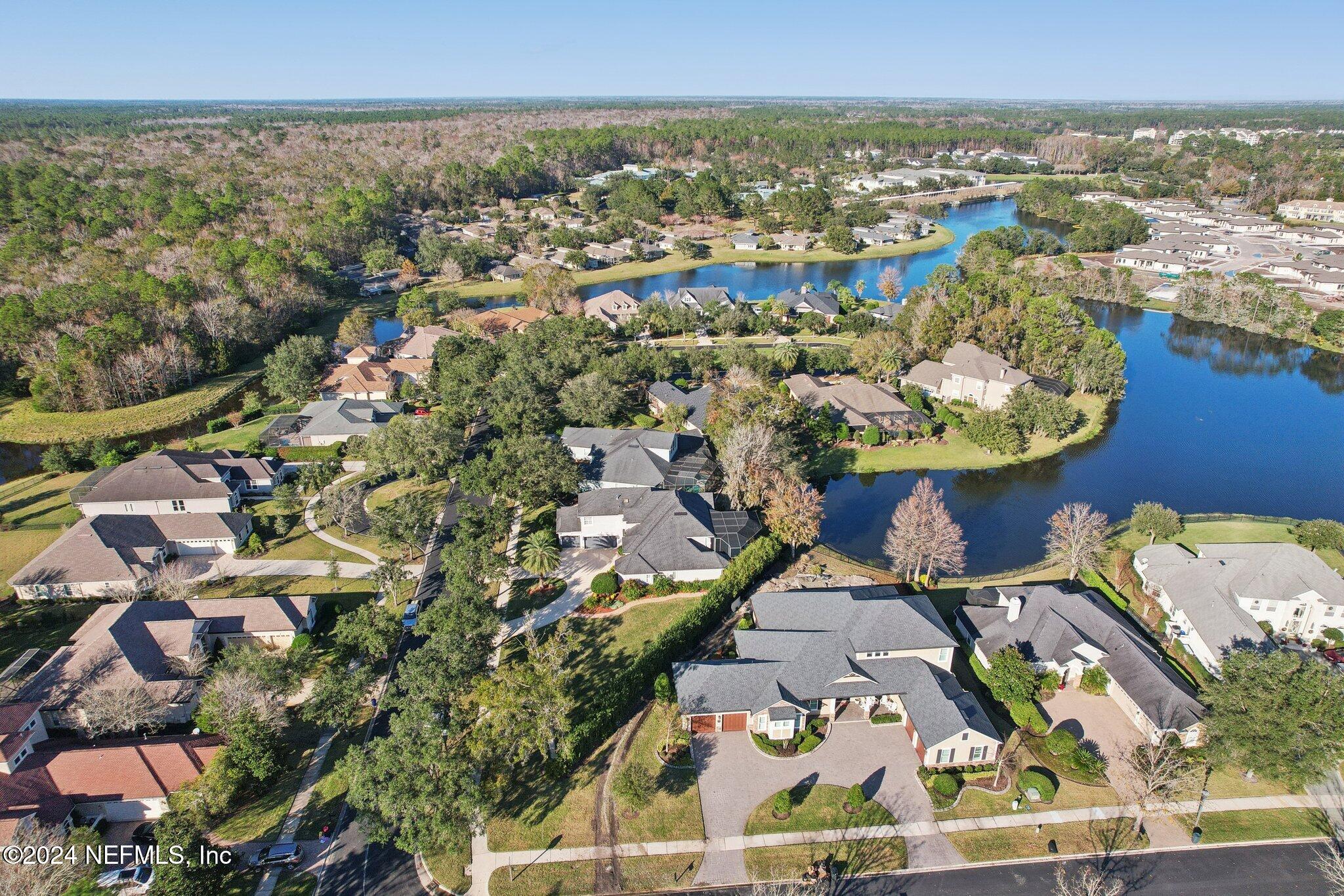 240 Pinehurst Pointe Drive St. Augustine, FL 32092 - Photo 59 of 70 an aerial view of a city