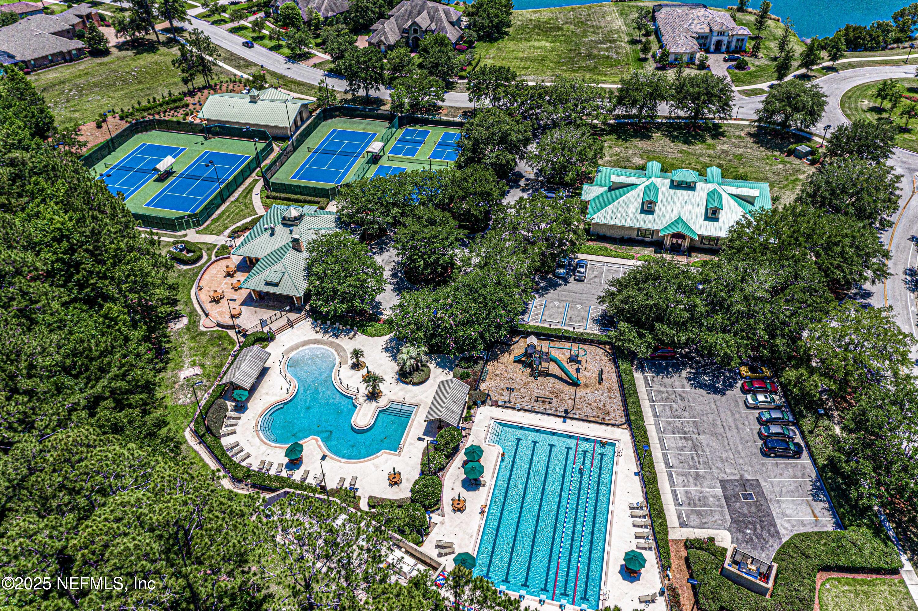 240 Pinehurst Pointe Drive St. Augustine, FL 32092 - Photo 66 of 70 an aerial view of residential house with outdoor space and swimming pool
