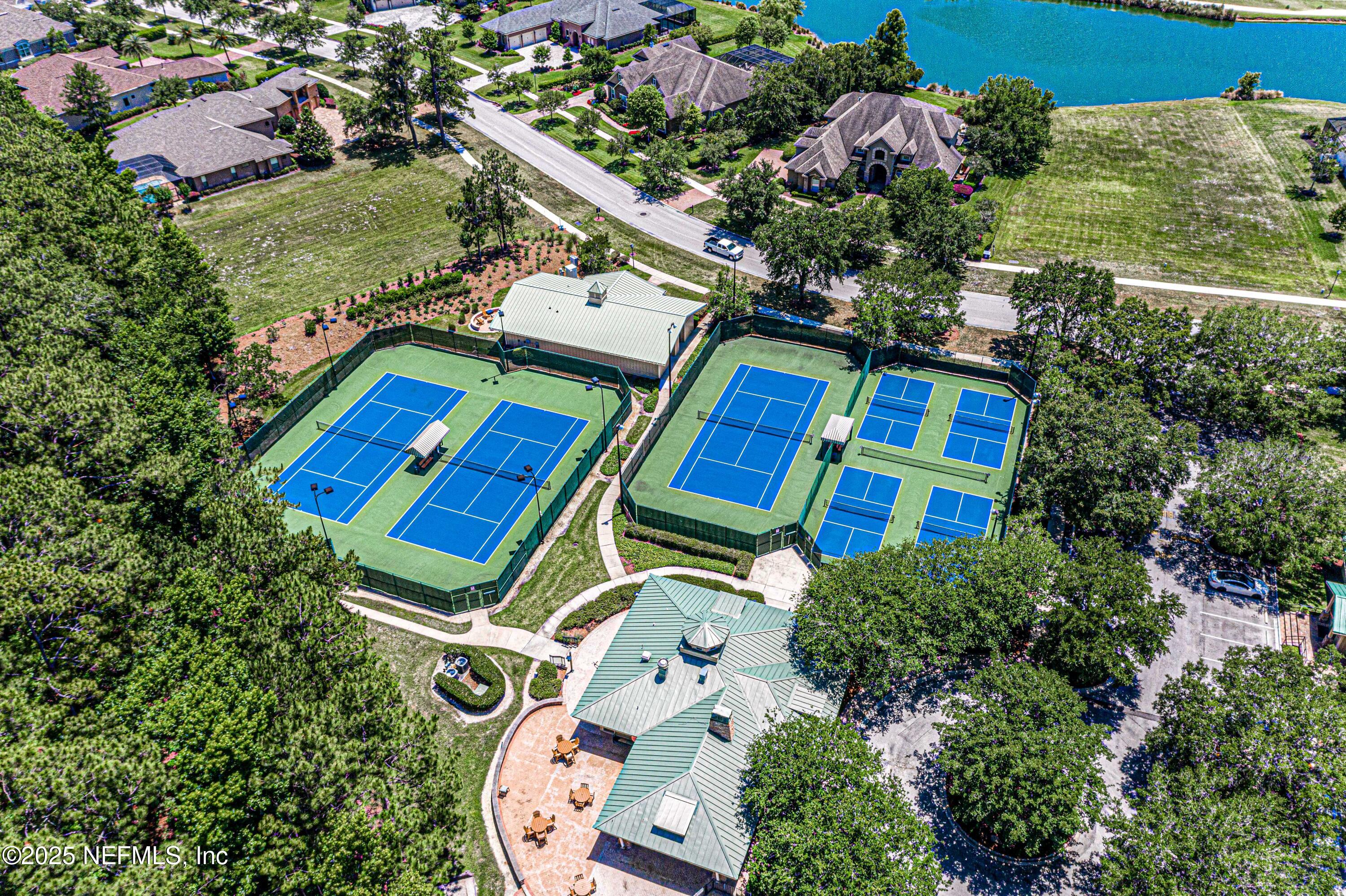 240 Pinehurst Pointe Drive St. Augustine, FL 32092 - Photo 67 of 70 an aerial view of a house with a yard basket ball court and outdoor seating