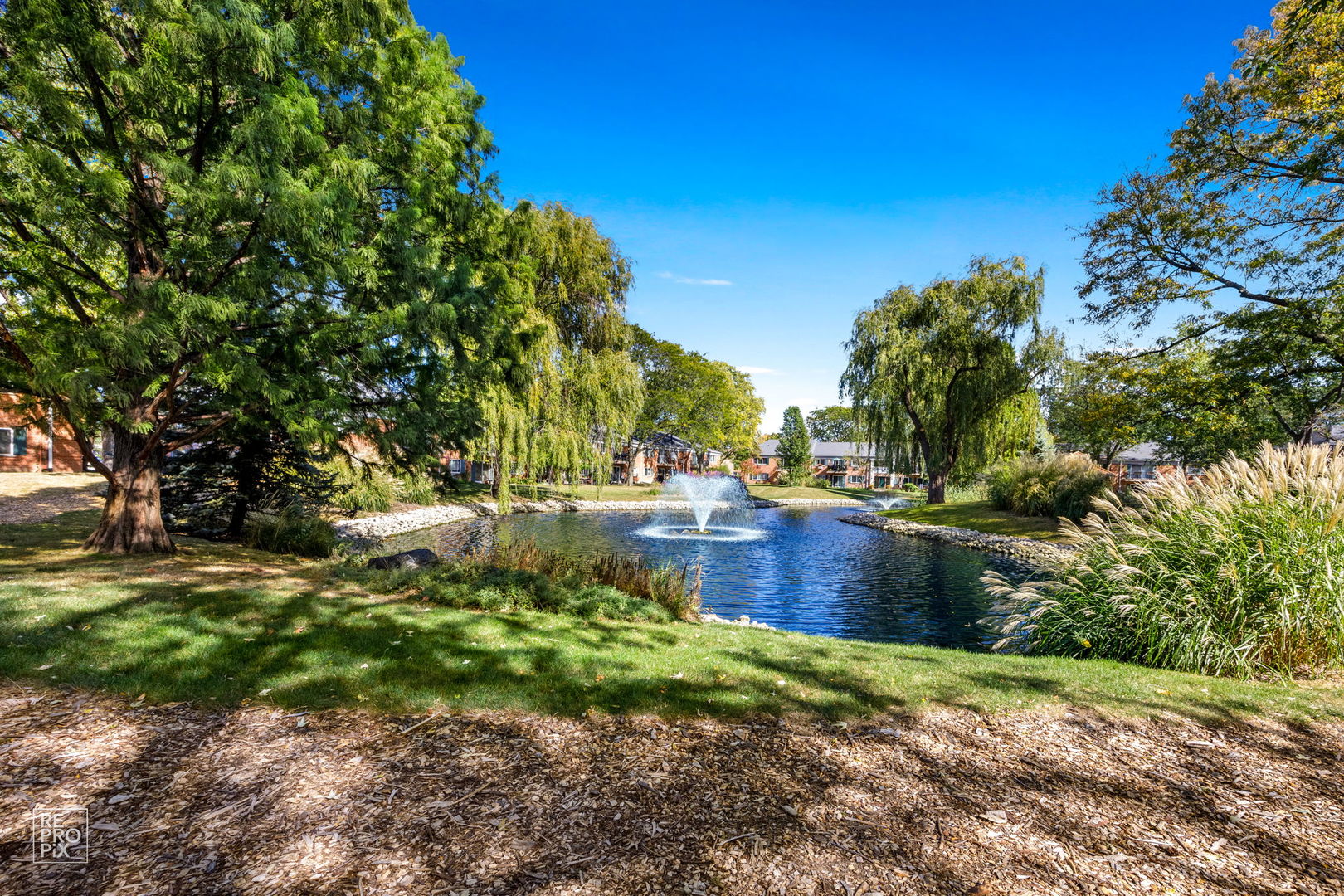 2303 South Goebbert Road, Unit A207 Arlington Heights, IL 60005 - Photo 14 of 15 a garden view