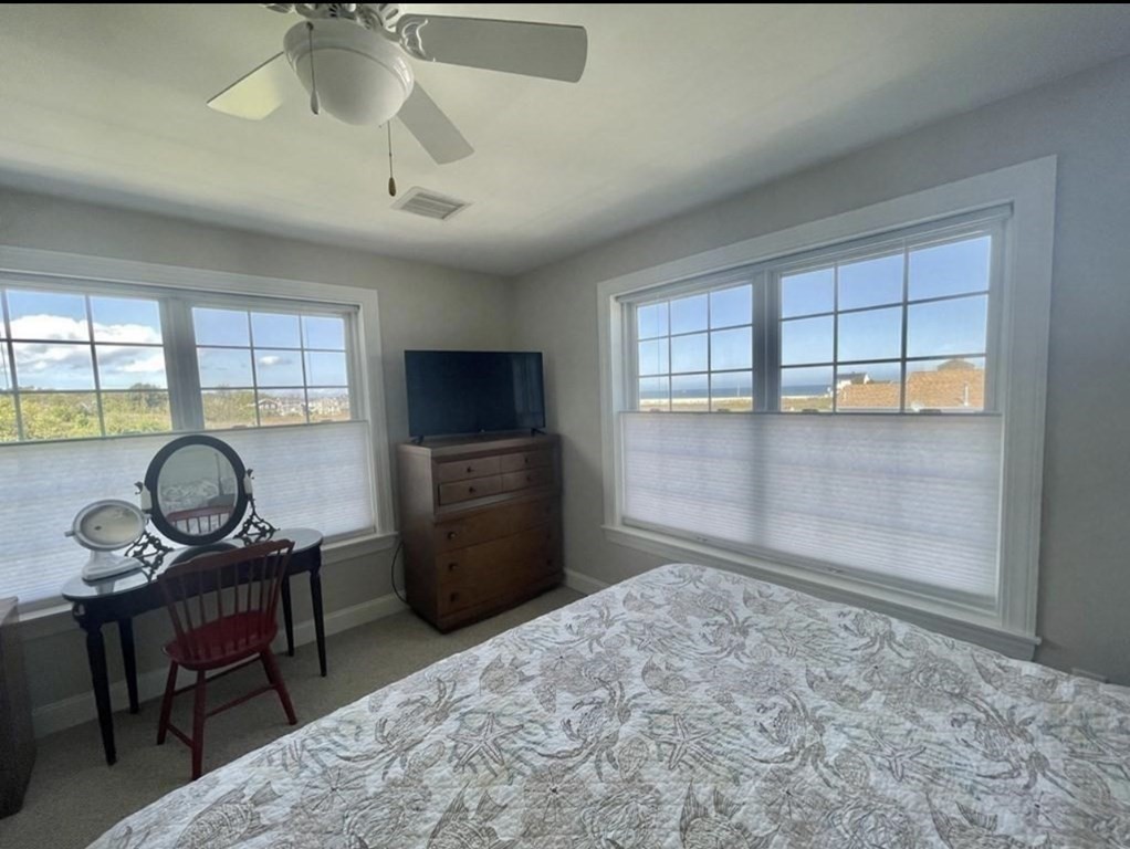 15 10th Avenue Scituate, MA 02066 - Photo 13 of 21 a bedroom with furniture and a window