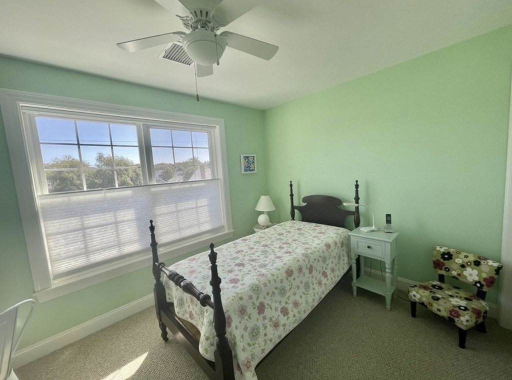 15 10th Avenue Scituate, MA 02066 - Photo 14 of 21 a bedroom with a bed and a window