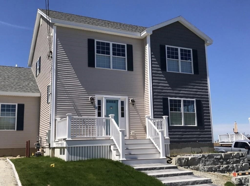 15 10th Avenue Scituate, MA 02066 - Photo 19 of 21 a front view of a house with a yard