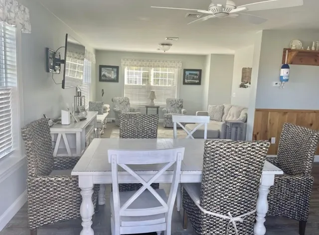 a view of a dining room with furniture