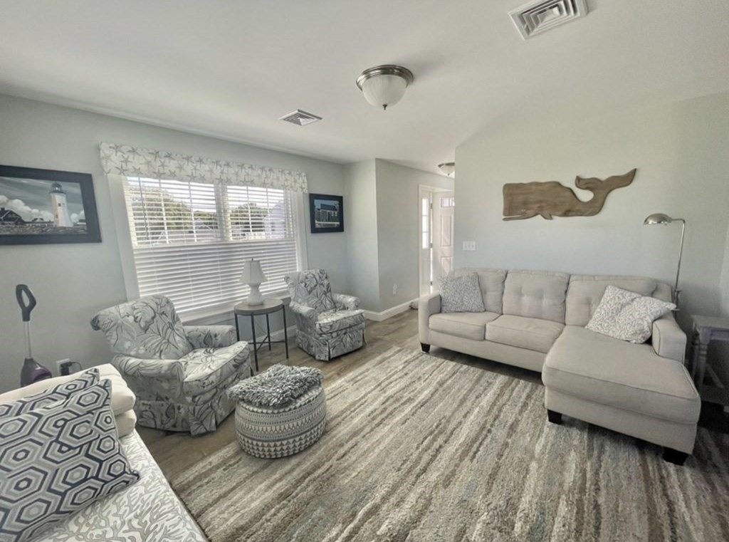 15 10th Avenue Scituate, MA 02066 - Photo 6 of 21 a living room with furniture and a large window