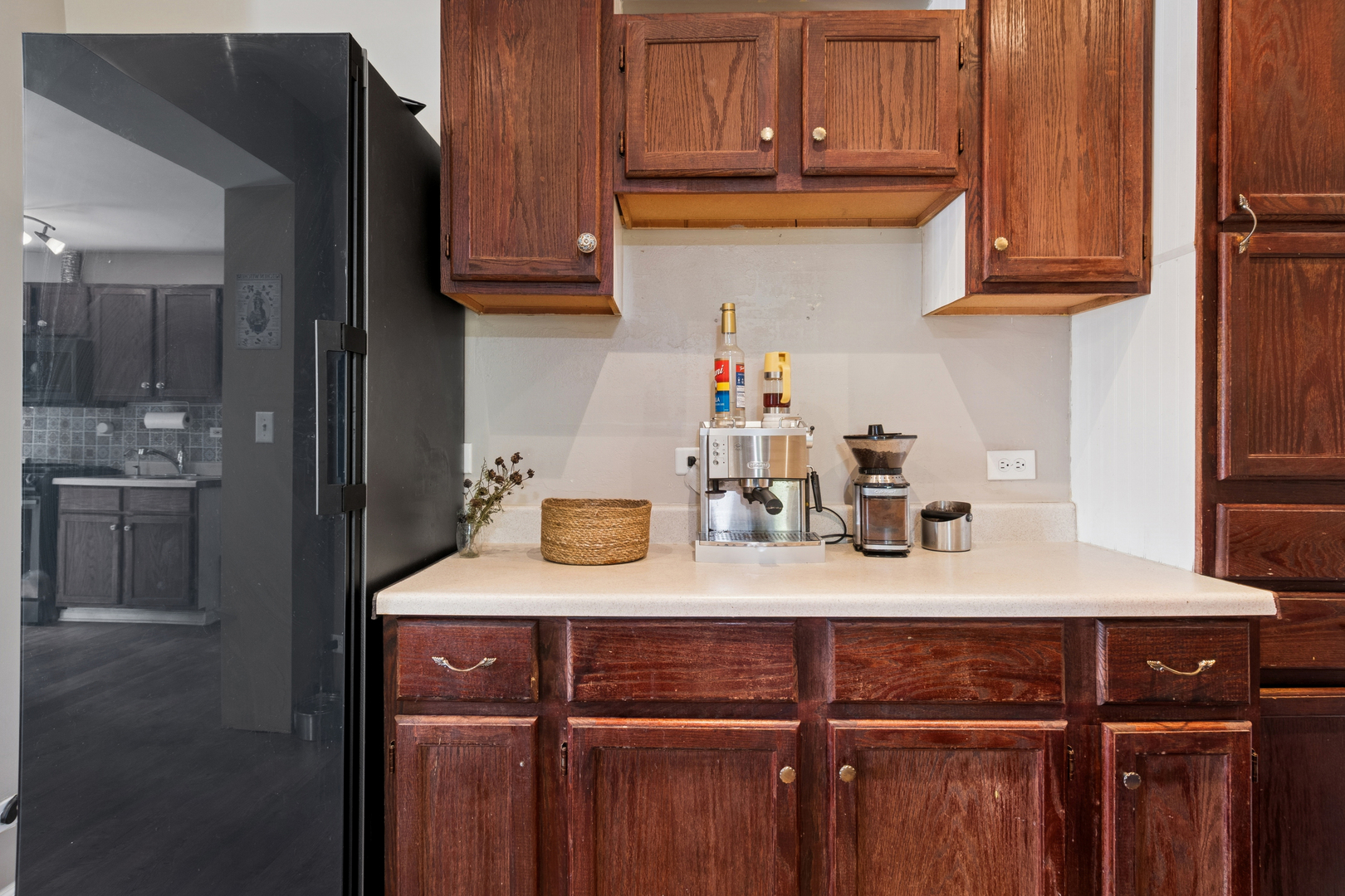 25W361 Doris Avenue Carol Stream, IL 60188 - Photo 6 of 25 a kitchen with a sink cabinets and wooden floor