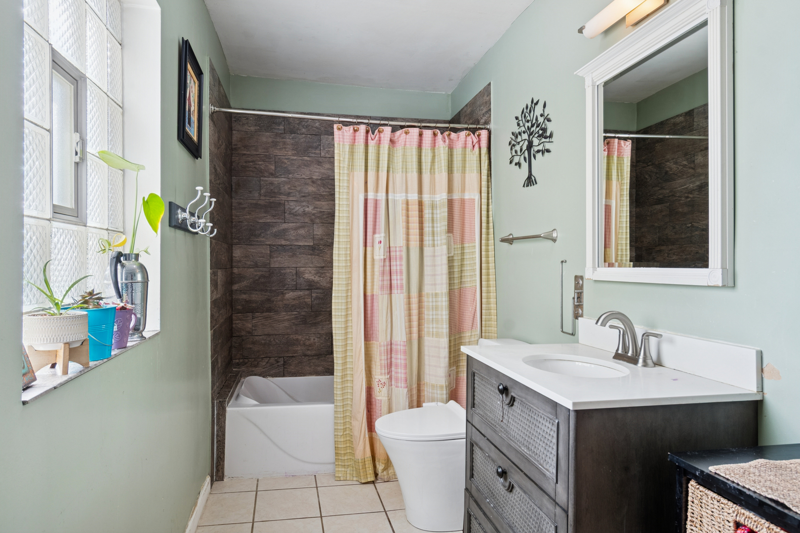 25W361 Doris Avenue Carol Stream, IL 60188 - Photo 7 of 25 a bathroom with a granite countertop sink a toilet and shower