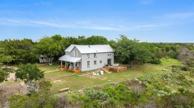 a view of a house with a big yard