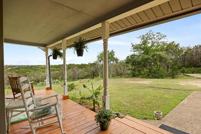 a view of a balcony with lake view and a ocean view