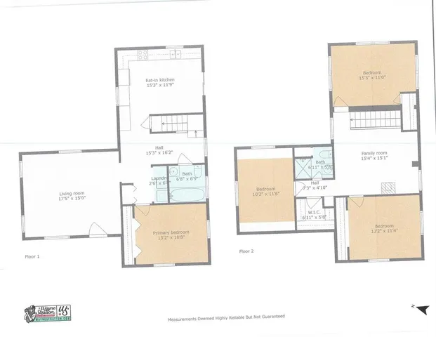 a view of a city and mountains in the background