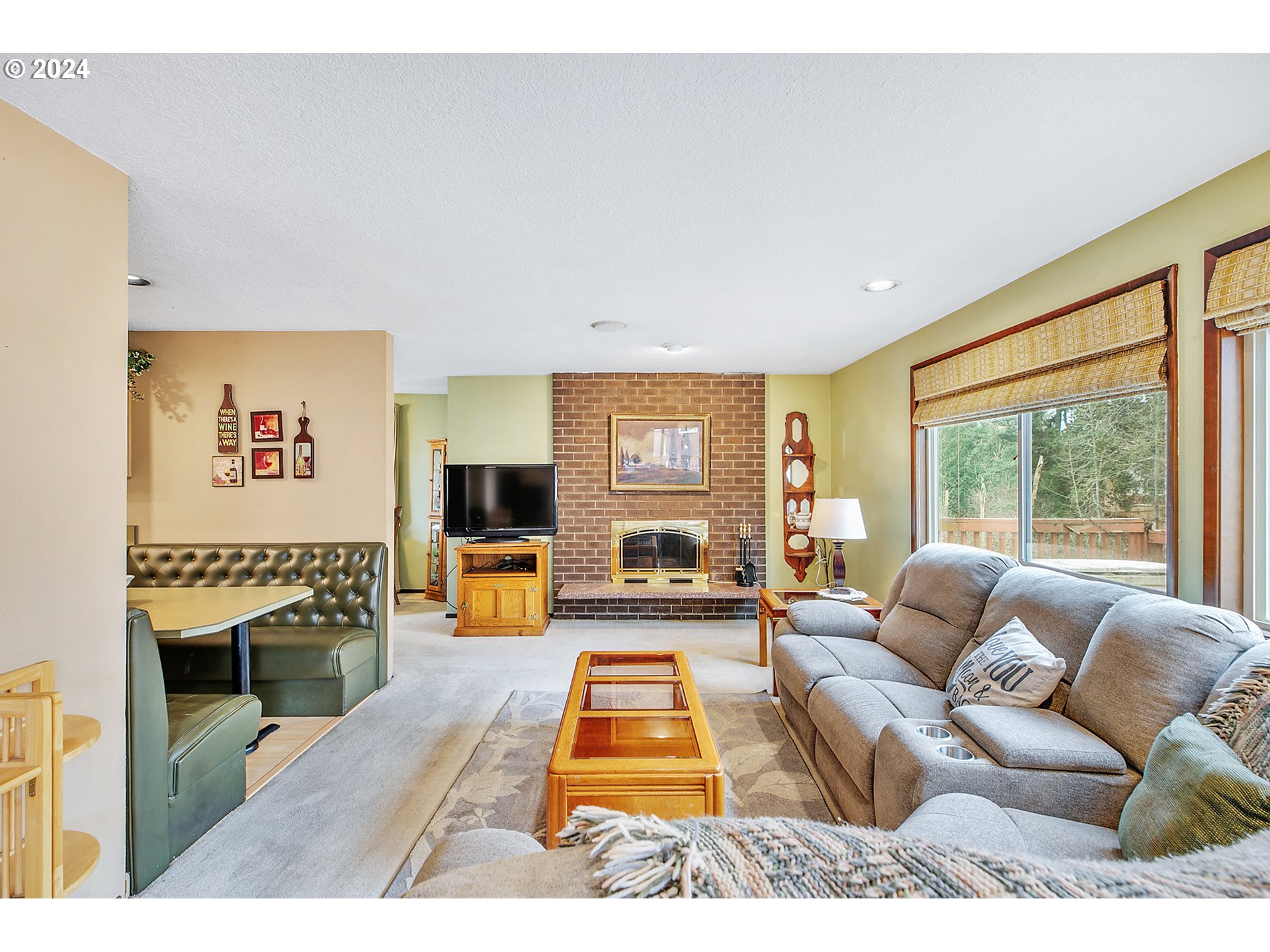 321 Northeast Scott Drive Gresham, OR 97030 - Photo 21 of 48 a living room with furniture large window and a flat screen tv