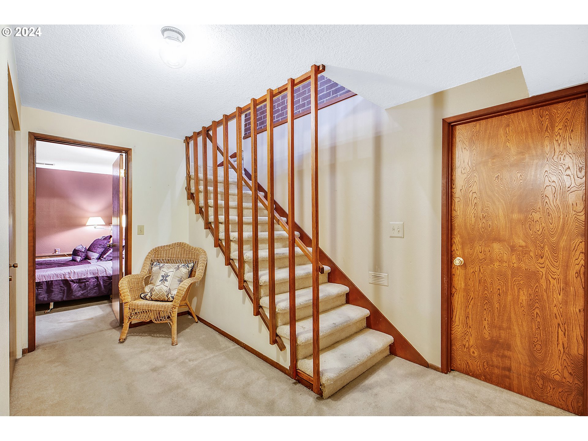 321 Northeast Scott Drive Gresham, OR 97030 - Photo 26 of 48 a view of a hallway with a couches and dining room view
