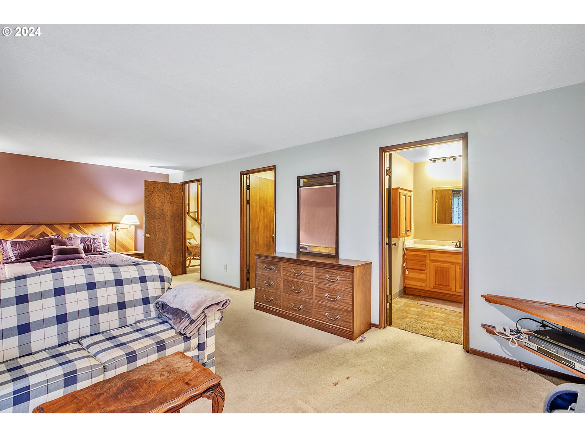321 Northeast Scott Drive Gresham, OR 97030 - Photo 31 of 48 a bedroom with a bed and wooden floor